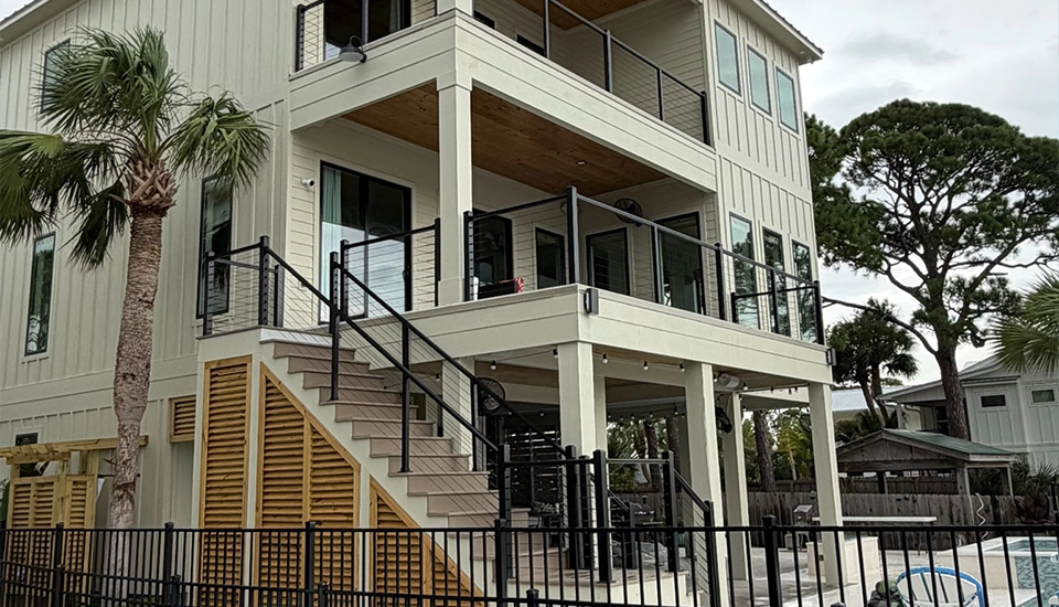 Two story house with reliable hand rails and balcony railing