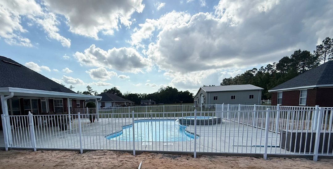 Iron fence around pool