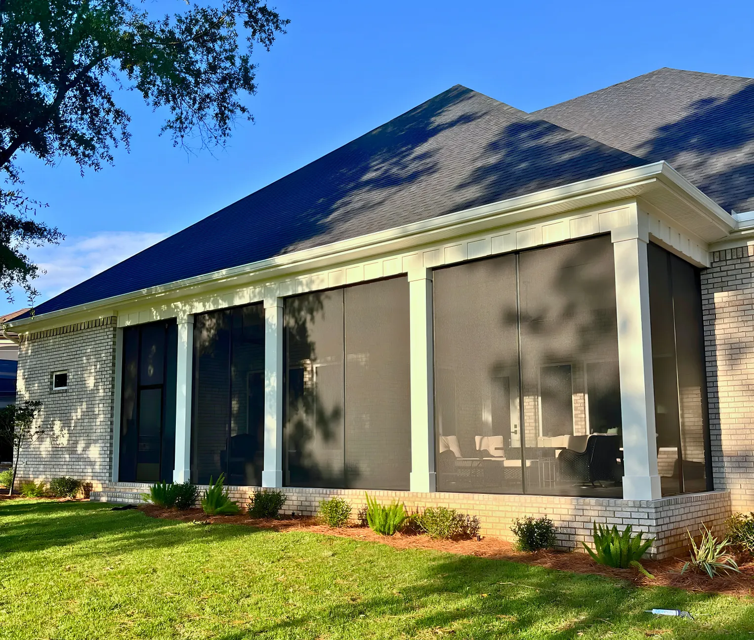 Exterior view of screened in porch on house
