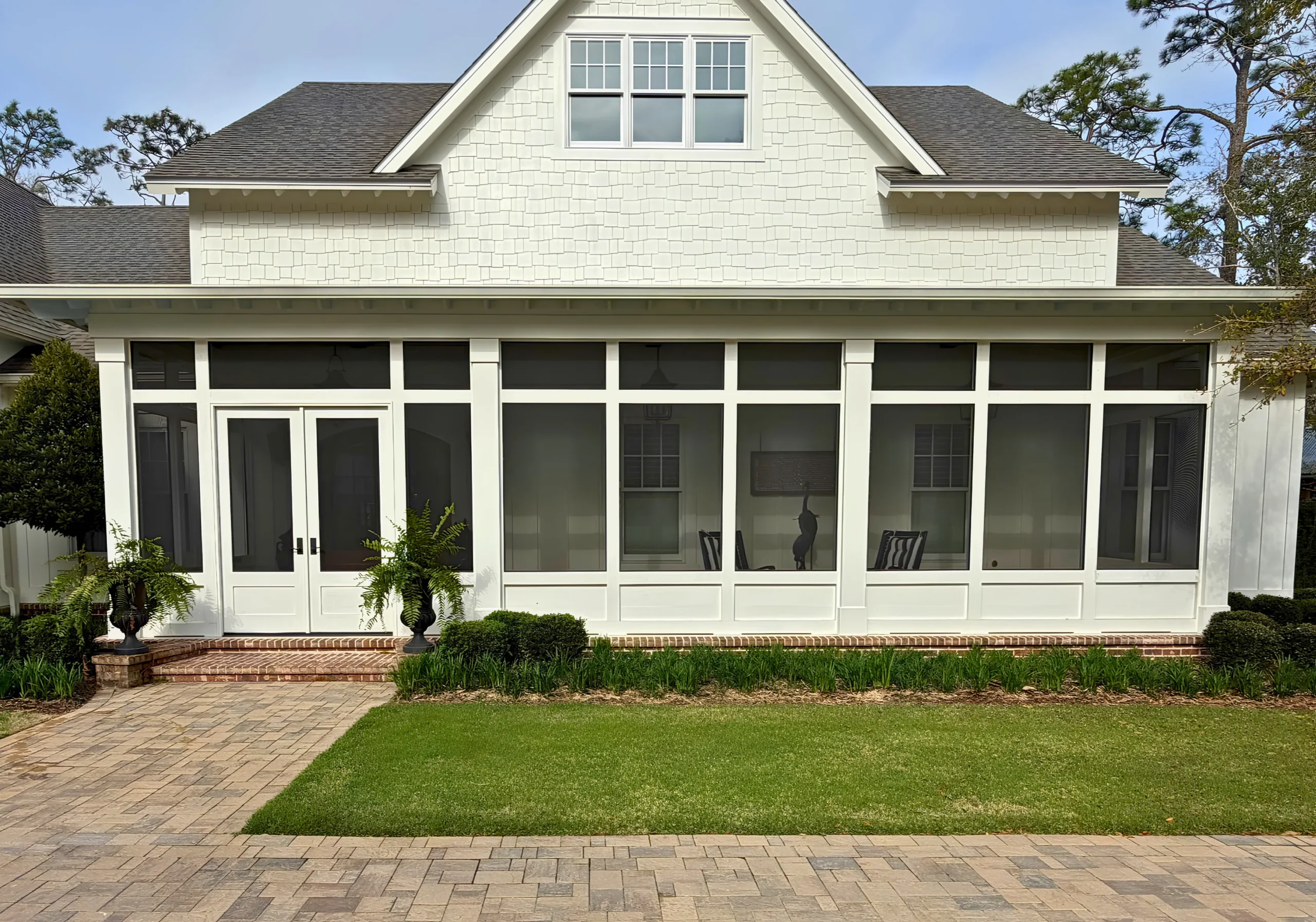 Exterior view of screened in porch on house